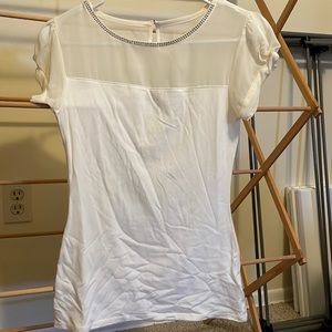 XS Express rhinestone collar and knitted sleeve detail